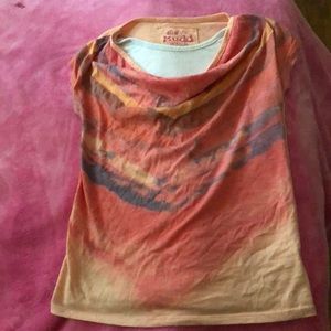 A peach colored shirt